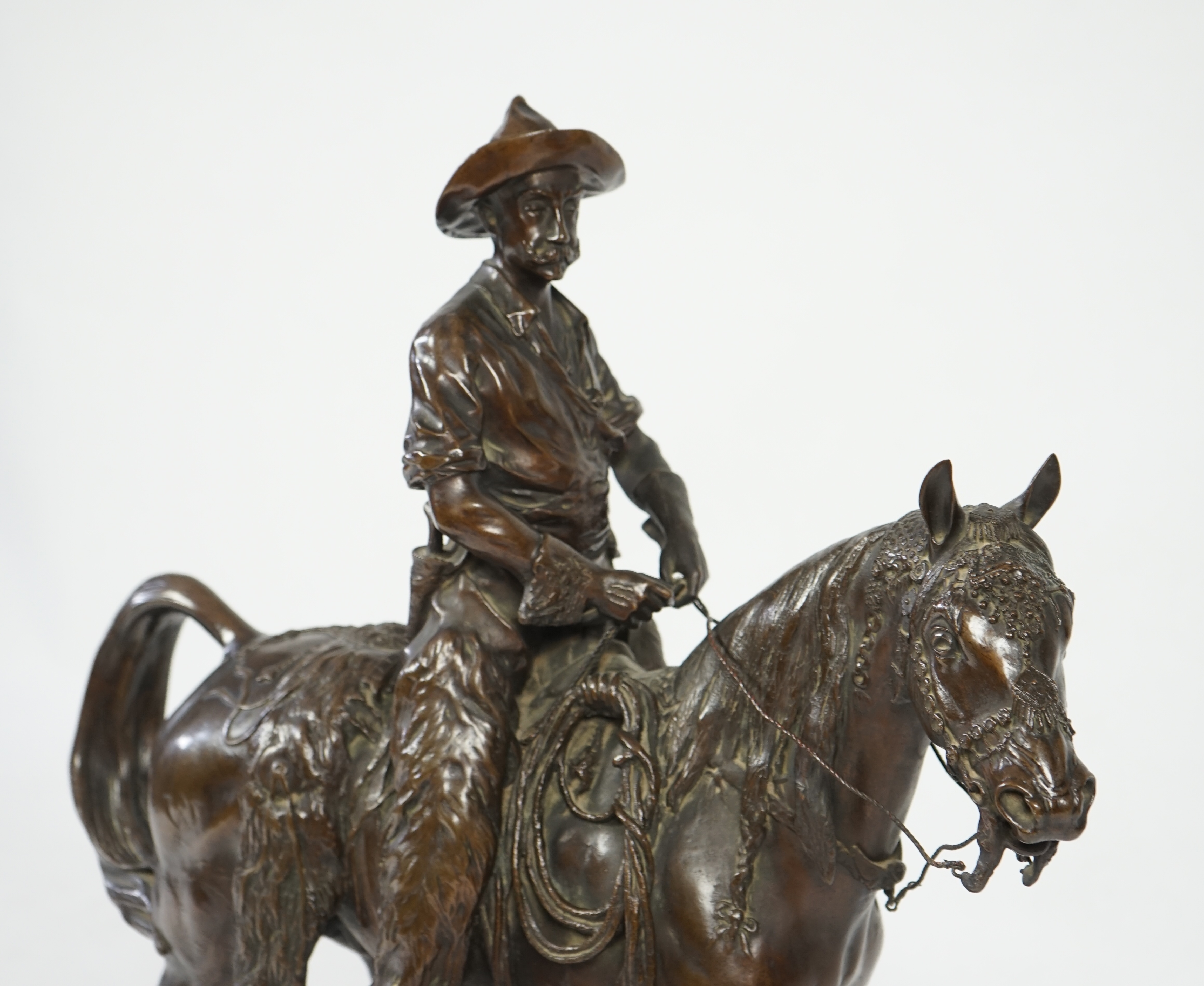 Walter Winans (St. Petersburg, 1852-Parsloe Park, Essex, 1920), a cast bronze of the artist, as a cowboy, riding the Arab stallion Skowronek, 50cm wide, 66cm high, overall 79.5cm high